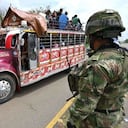 Los indígenas llegan a Cali en buses y camiones.
