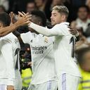 Real Madrid's Lucas Vazquez, second from left, celebrates with teammates after scoring his side's second goal during the Spanish La Liga soccer match between Real Madrid and Sevilla at the Santiago Bernabeu stadium in Madrid, Saturday, Oct. 22, 2022. (AP Photo/Manu Fernandez)