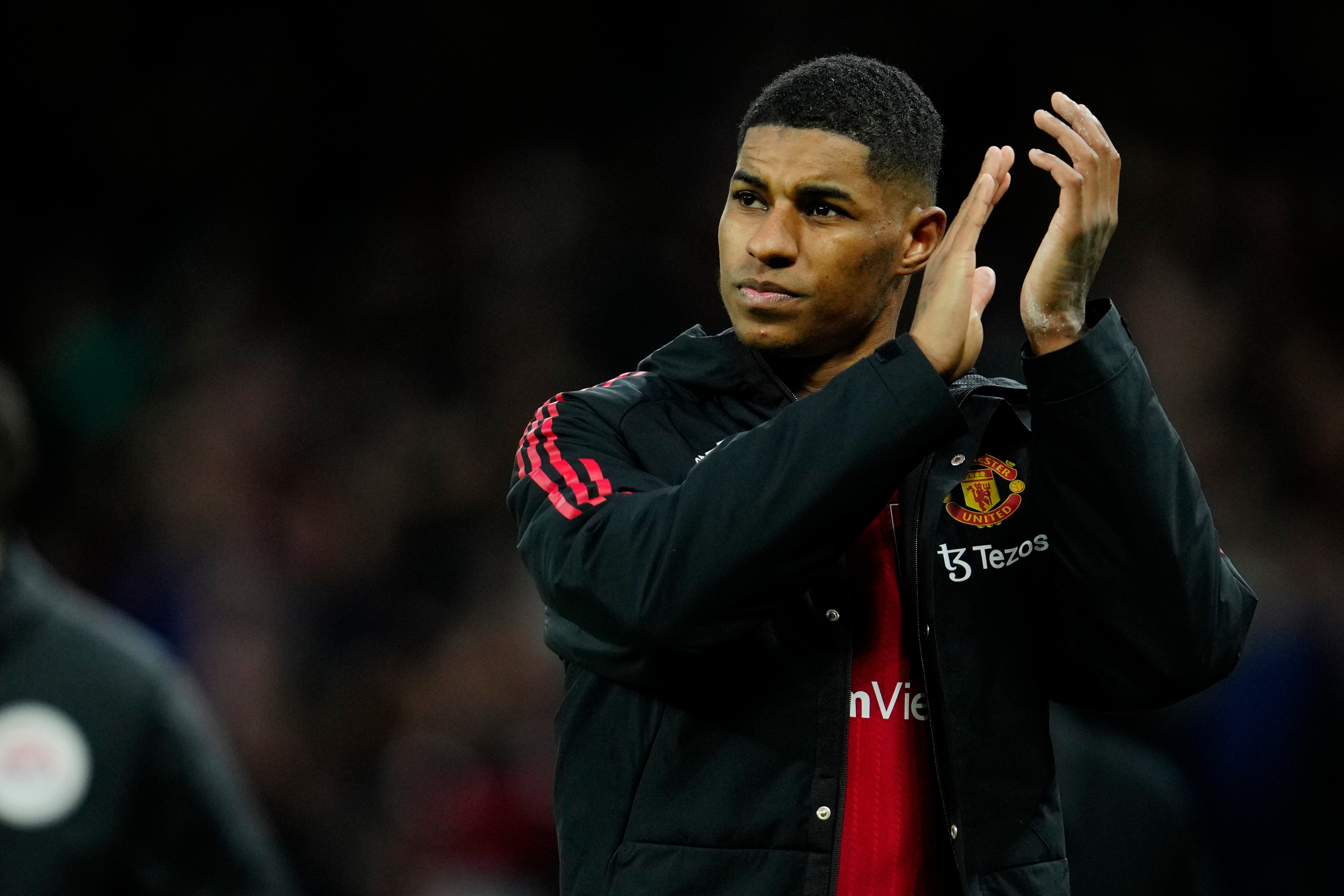 Manchester United's Marcus Rashford walks off after the English FA Cup quarterfinal soccer match between Manchester United and Fulham at the Old Trafford stadium in Manchester, England, Sunday, March 19, 2023. (AP Photo/Jon Super)