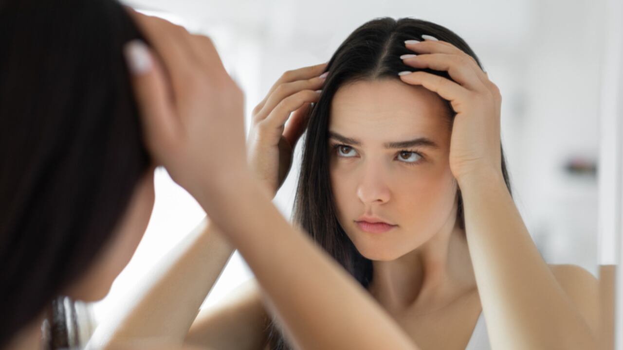 Woman having problem with hair loss