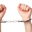 hands with handcuffs