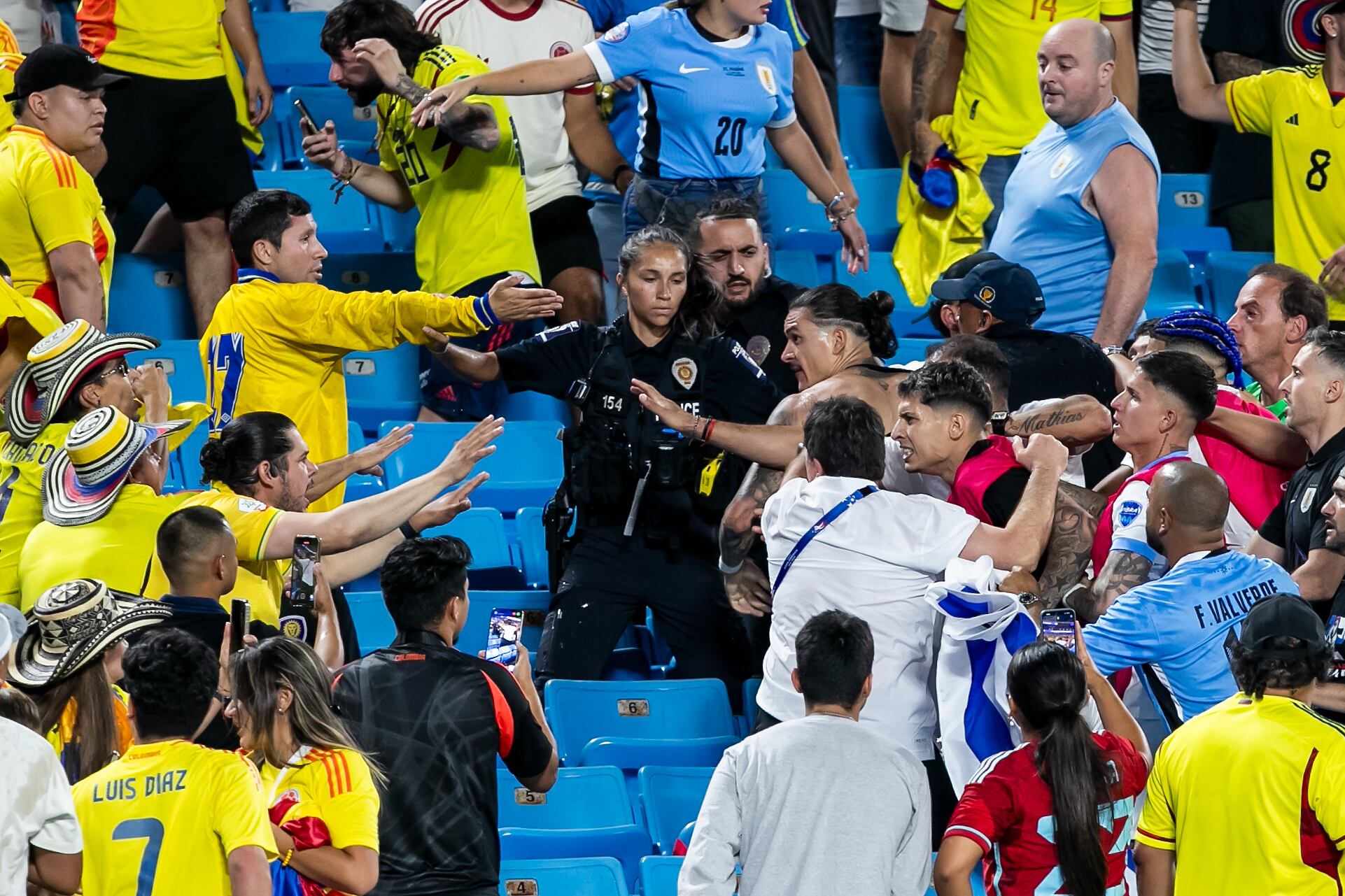 CHARLOTTE, NC - JULY 10: Uruguay forward Darwin Núñez (19) engages with hostile fans in the stands after the CONMEBOL Copa America semifinal between Uruguay and Colombia on Wednesday July 10, 2024 at Bank of America Stadium in Charlotte, NC.  (Photo by Nick Tre. Smith/Icon Sportswire via Getty Images)