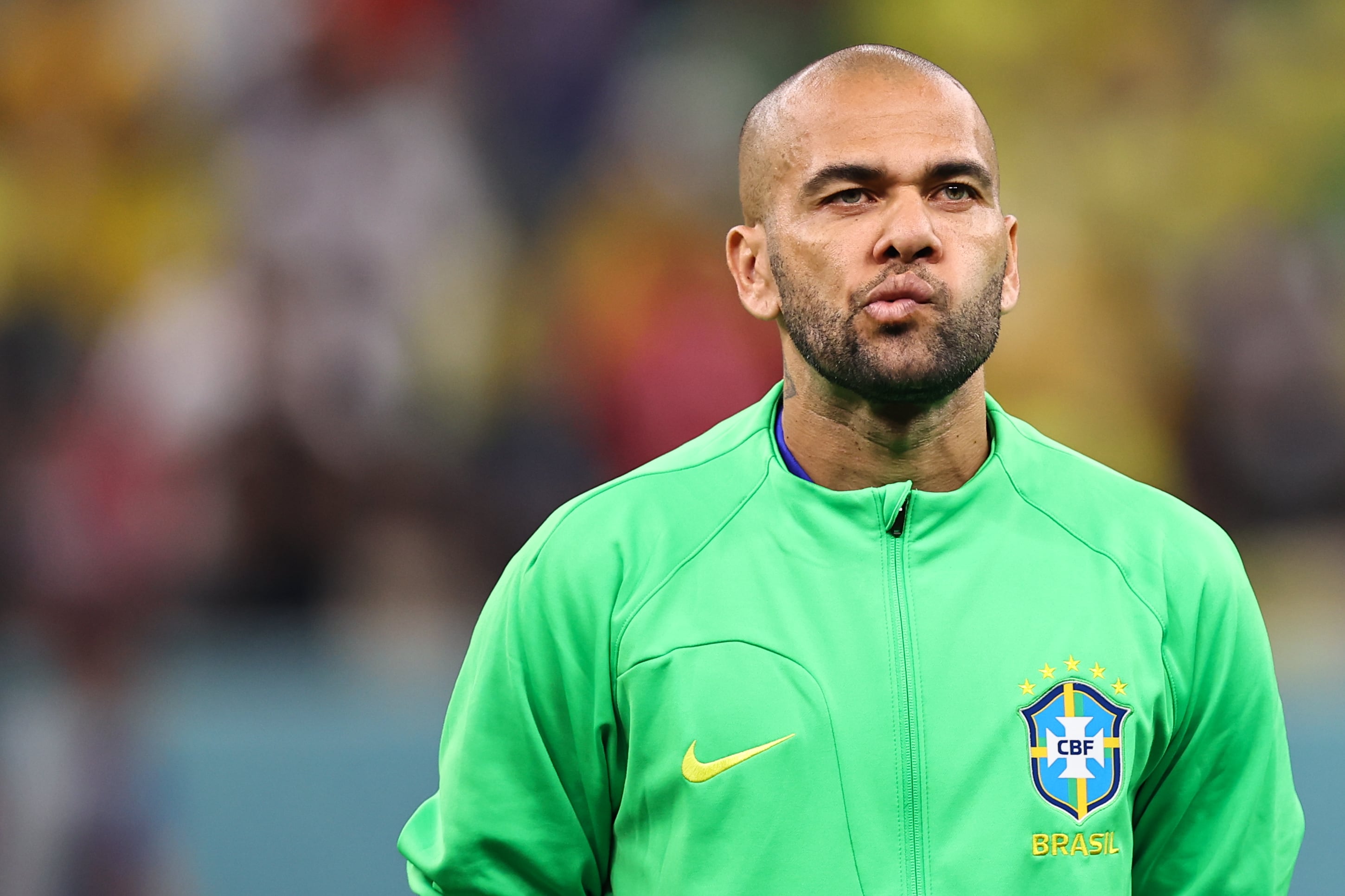 LUSAIL CITY, QATAR - DECEMBER 02: Dani Alves of Brazil captains his side at 39 years old making him the oldest world cup captain during the FIFA World Cup Qatar 2022 Group G match between Cameroon and Brazil at Lusail Stadium on December 2, 2022 in Lusail City, Qatar. (Photo by Robbie Jay Barratt - AMA/Getty Images)