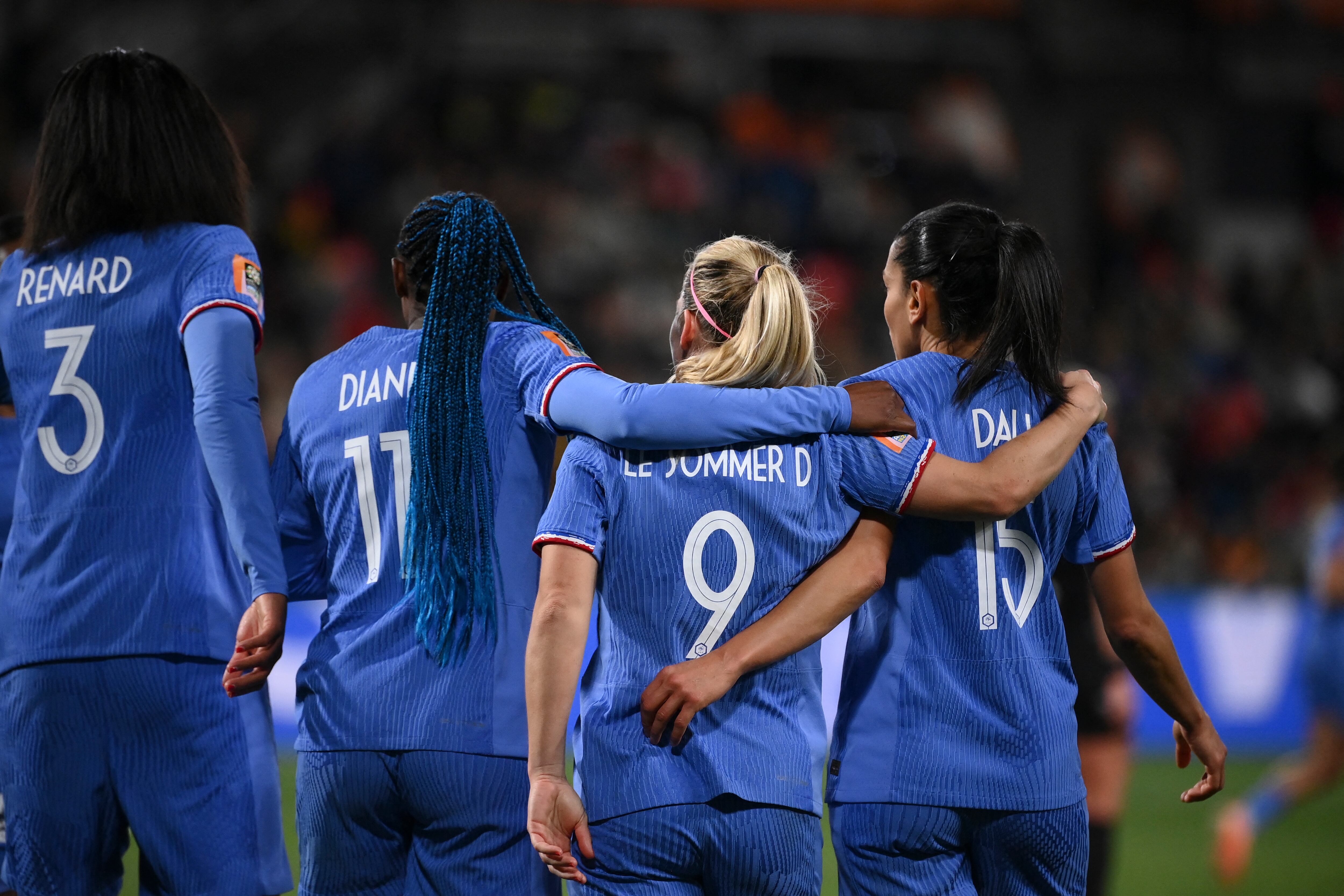 rance's forward #09 Eugenie Le Sommer celebrates with teammates scoring her team's fourth goal during the Australia and New Zealand 2023 Women's World Cup round of 16 football match between France and Morocco at Hindmarsh Stadium in Adelaide on August 8, 2023. (Photo by FRANCK FIFE / AFP)