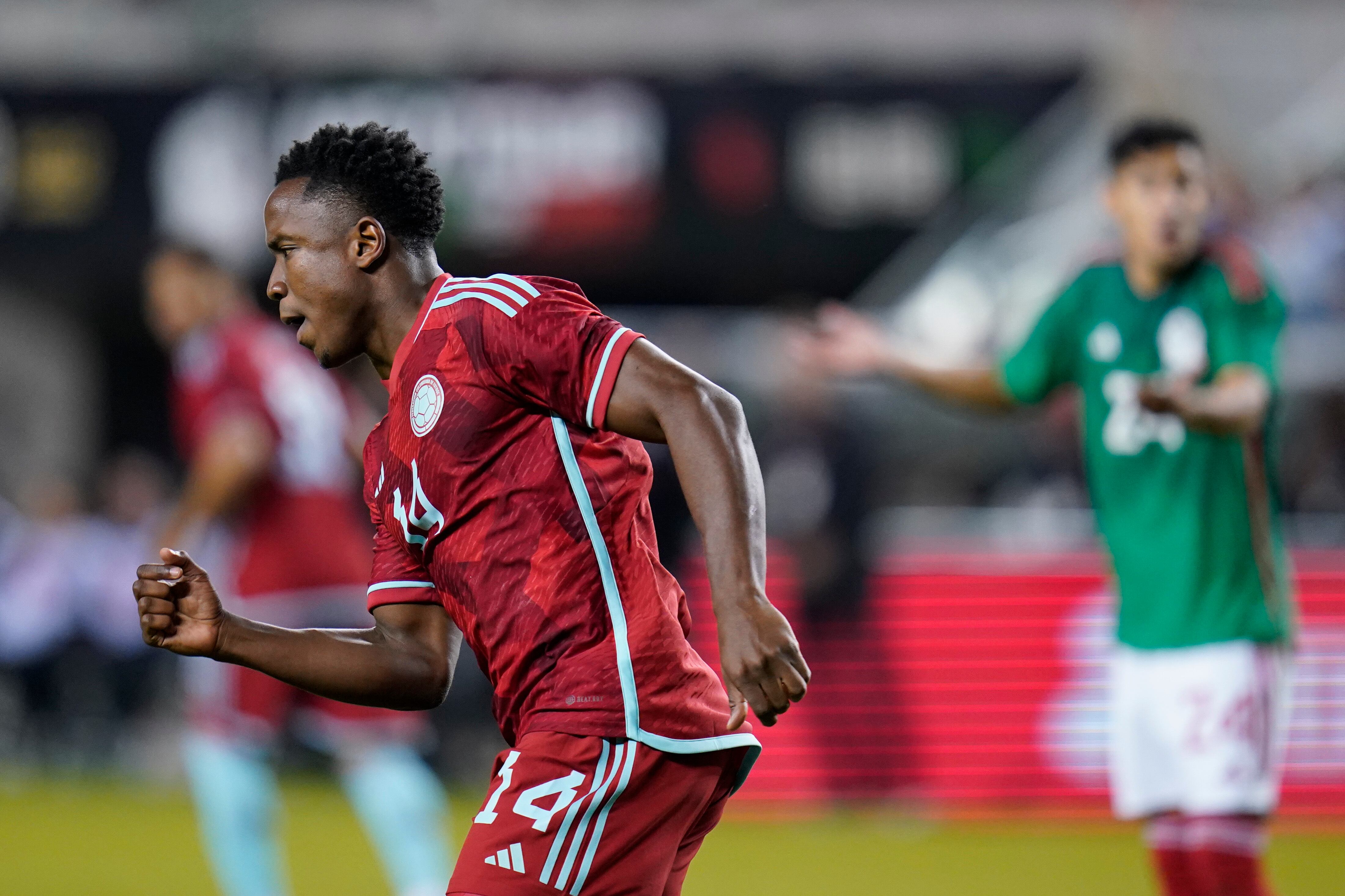 Colombia forward Luis Sinisterra celebrates after scoring a goal against Mexico during the second half of an international friendly soccer match in Santa Clara, Calif., Tuesday, Sept. 27, 2022. (AP Photo/Godofredo A. Vásquez)