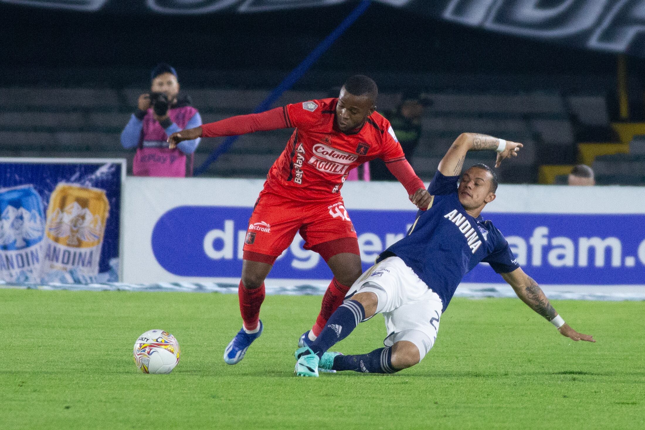 Leonardo Castro of Millonarios is disputing the ball with Jader Quinones of America during a match between Millonarios F.C. and America de Cali on matchday 5 as part of the BetPlay DIMAYOR I 2024 League, played at the Nemesio Camacho El Campin Stadium in Bogota, Colombia. (Photo by Daniel Garzon Herazo/NurPhoto via Getty Images)