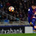 FILE - In this Jan.14, 2018 file photo FC Barcelona's Lionel Messi kicks the ball and scores the fourth goal of his team against Real Sociedad during the Spanish La Liga soccer match between Barcelona and Real Sociedad, at Anoeta stadium, in San Sebastian, northern Spain. Barcelona announced Thursday Aug. 5, 2021 that Lionel Messi will not stay with the club. He is leaving after 17 successful seasons in which he propelled the Catalan club to glory, helping it win numerous domestic and international titles since debuting as a teenager. (AP Photo/Alvaro Barrientos, File)