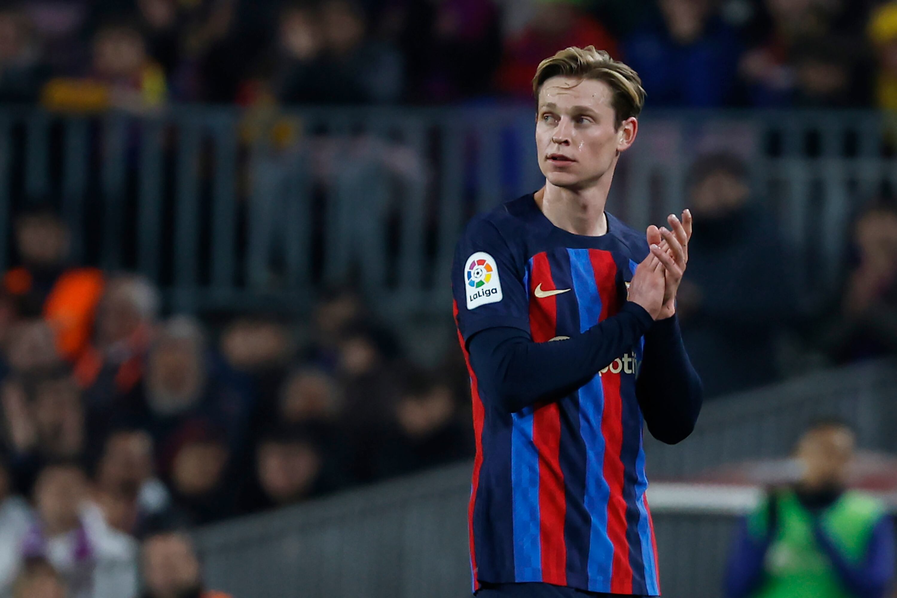 Barcelona's Frenkie de Jong applauds during the Spanish La Liga soccer match between Barcelona and Cadiz CF at the Camp Nou stadium in Barcelona, Spain, Sunday, Feb. 19, 2023. (AP Photo/Joan Monfort)