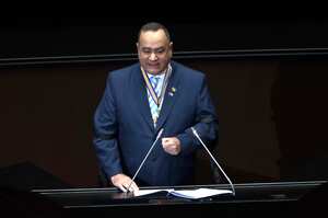Guatemala's President Alejandro Giammattei delivers a speech in the Legislative Yuan Chamber in Taipei, Taiwan, Tuesday, April 25, 2023. Giammattei is on a four-day visit to Taiwan to reaffirm his support. (AP Photo/Chiang Ying-ying)