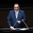 Guatemala's President Alejandro Giammattei delivers a speech in the Legislative Yuan Chamber in Taipei, Taiwan, Tuesday, April 25, 2023. Giammattei is on a four-day visit to Taiwan to reaffirm his support. (AP Photo/Chiang Ying-ying)