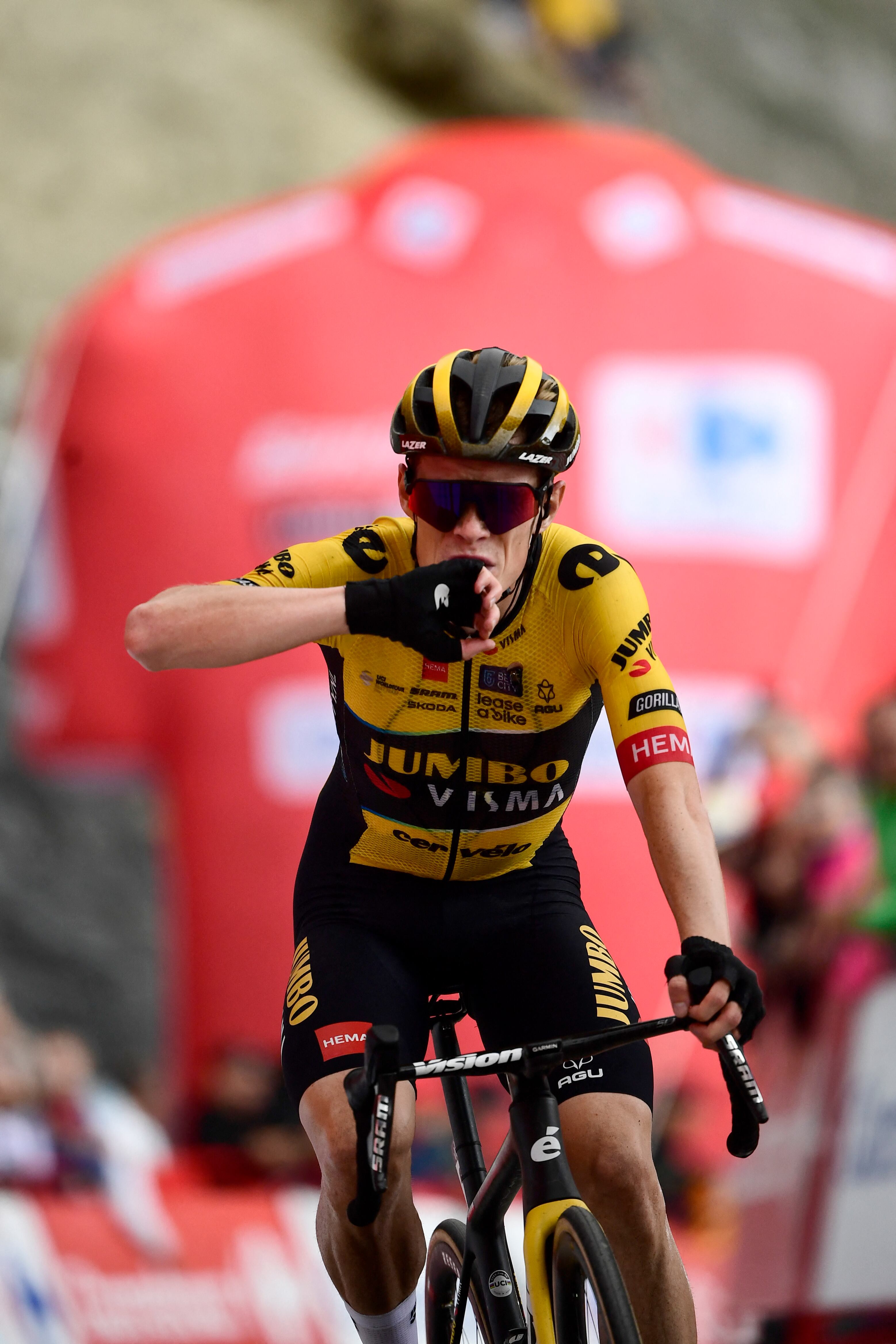 Team Jumbo-Visma's Danish rider Jonas Vingegaard celebrates winning in the stage 13 of the 2023 La Vuelta cycling tour of Spain, a 134,7 km race between Formigal and the Col du Tourmalet in France, on September 8, 2023. (Photo by ANDER GILLENEA / AFP)