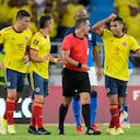 Colombia's Radamel Falcao Garcia asks referee Patricio Loustau, of Argentina, to declare a penalty in favor his team during a qualifying soccer match for the FIFA World Cup Qatar 2022 against Brazil in Barranquilla, Colombia, Sunday, Oct. 10, 2021. (AP Photo/Fernando Vergara)
