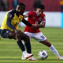 Ecuador's Moises Caicedo, left, and Chile's Claudio Baeza struggle for the ball during a World Cup Qatar 2022 qualifying soccer match at the Rodrigo Paz Delgado stadium in Quito, Ecuador, Sunday, Sept.5, 2021. (AP Photo/Jose Jacome, Pool via AP)