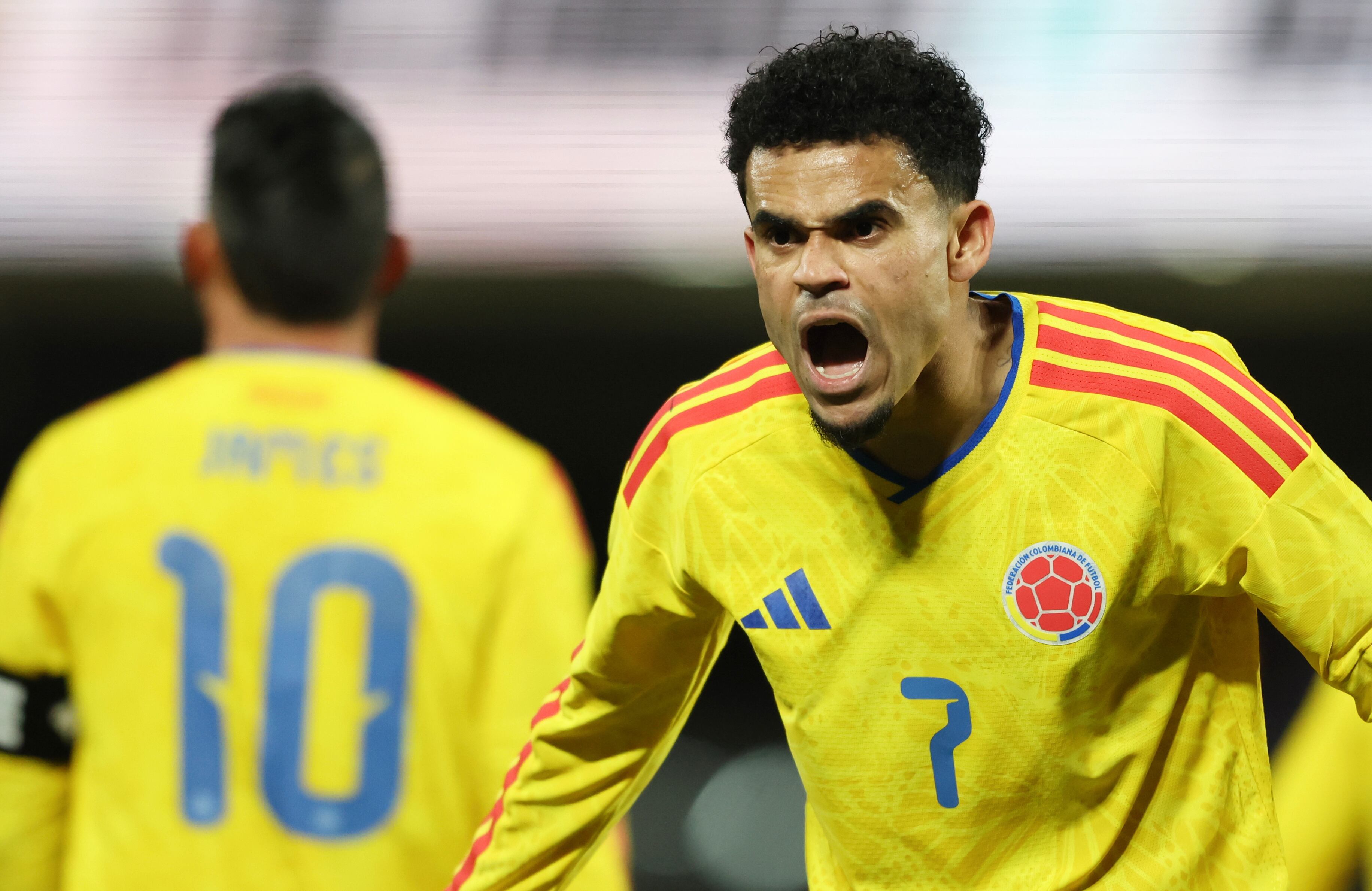 Colombia's Luis Díaz (7) reacts after scoring during the second half of an international friendly soccer match against Australia, Tuesday, Nov. 18, 2025, in New York. (AP Photo/Heather Khalifa)