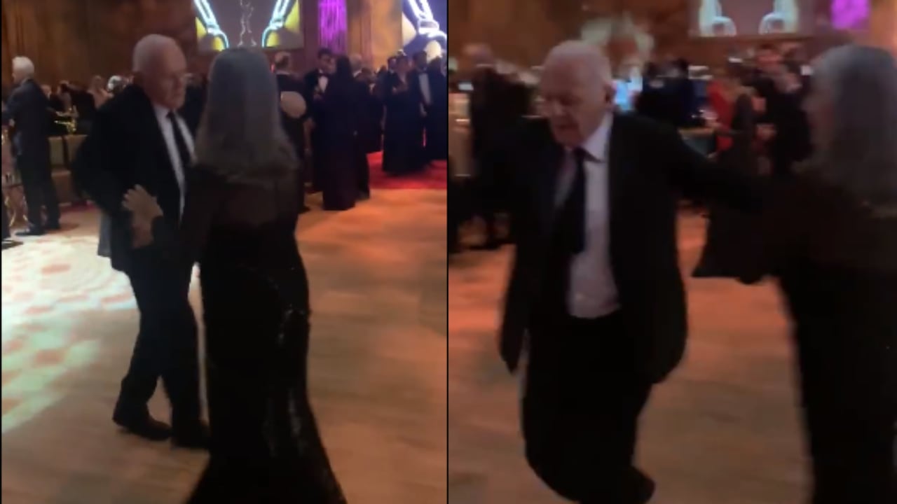 Anthony Hopkins bailando con su pareja durante la fiesta de los Premios Óscar.