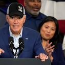 President Joe Biden wears a union hat as he speaks during a visit to the U.A. Local 190 Training Center in Ann Arbor, Mich., Friday, Sept. 6, 2024. (AP Photo/Paul Sancya)