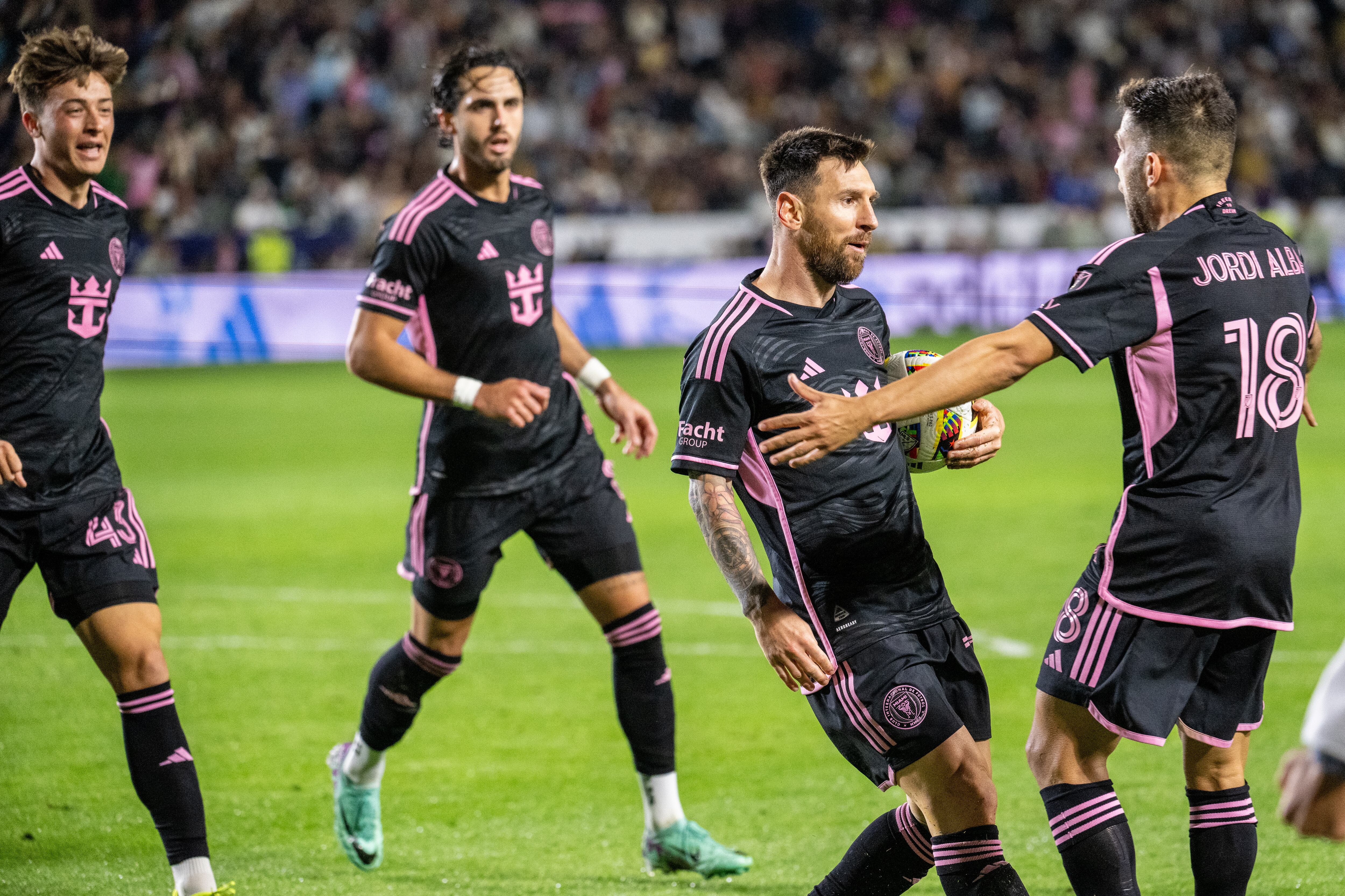 CARSON, CA - FEBRUARY 25: Lionel Messi #10 celebrates his goal with Jordi Alba #18 of Inter Miami during the match against Los Angeles Galaxy at Dignity Health Sports Park on February 25, 2024 in Carson, California.  The match ended in a 1-1 draw. (Photo by Shaun Clark/Getty Images)