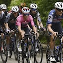 Belgium's Remco Evenepoel, center, pedals with the pack during the third stage of the Giro d'Italia cycling race from Vasto to Melfi, Italy, Monday, May 8, 2023. (Fabio Ferrari/LaPresse via AP)