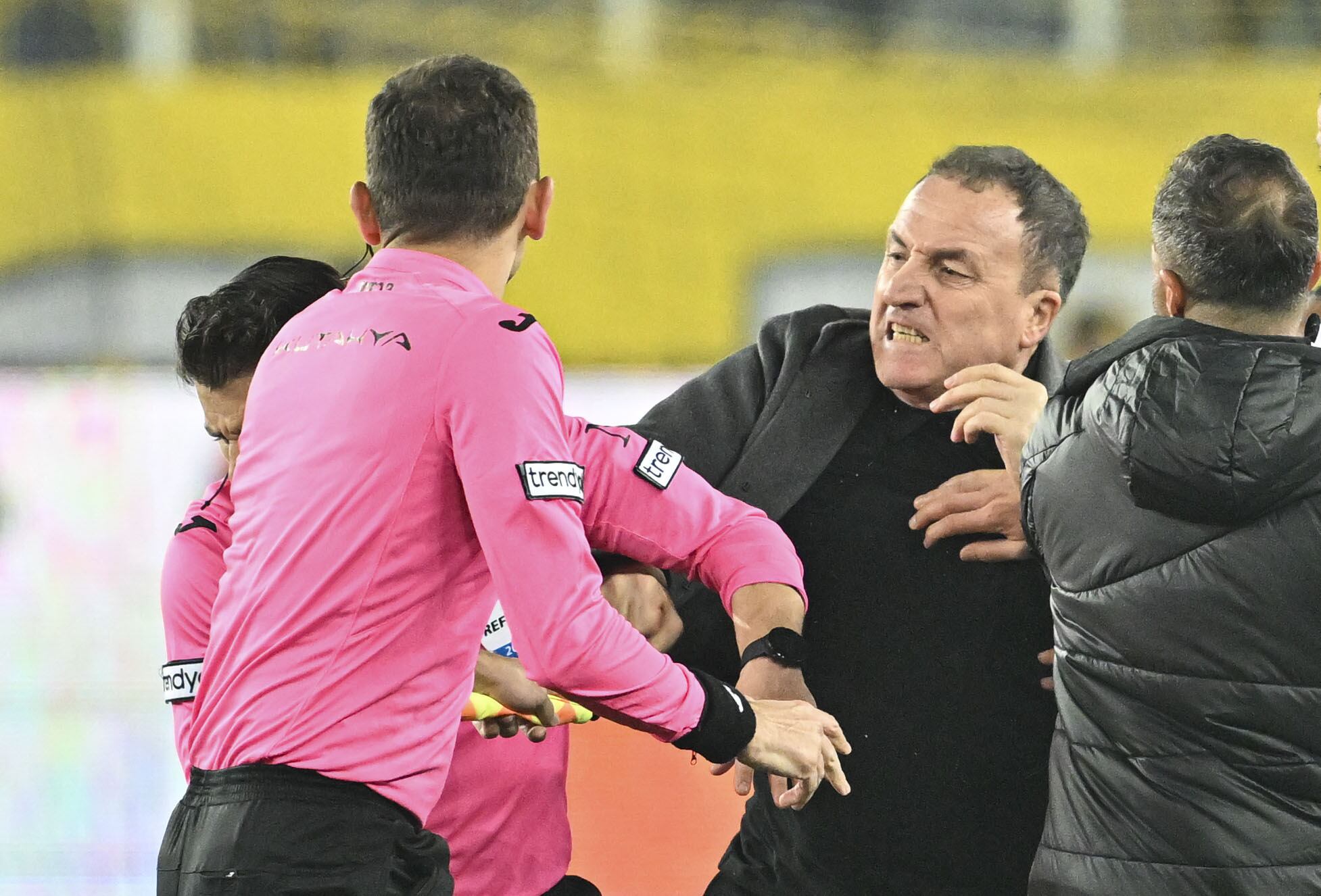ANKARA, TURKIYE - DECEMBER 11: Faruk Koca, President of MKE Ankaragucu throws a punch to the referee Halil Umut Meler after the Turkish Super Lig week 15 football match between MKE Ankaragucu and Rizespor at Eryaman Stadium in Ankara, Turkiye on December 11, 2023. The match ended 1-1. (Photo by Emin Sansar/Anadolu via Getty Images)