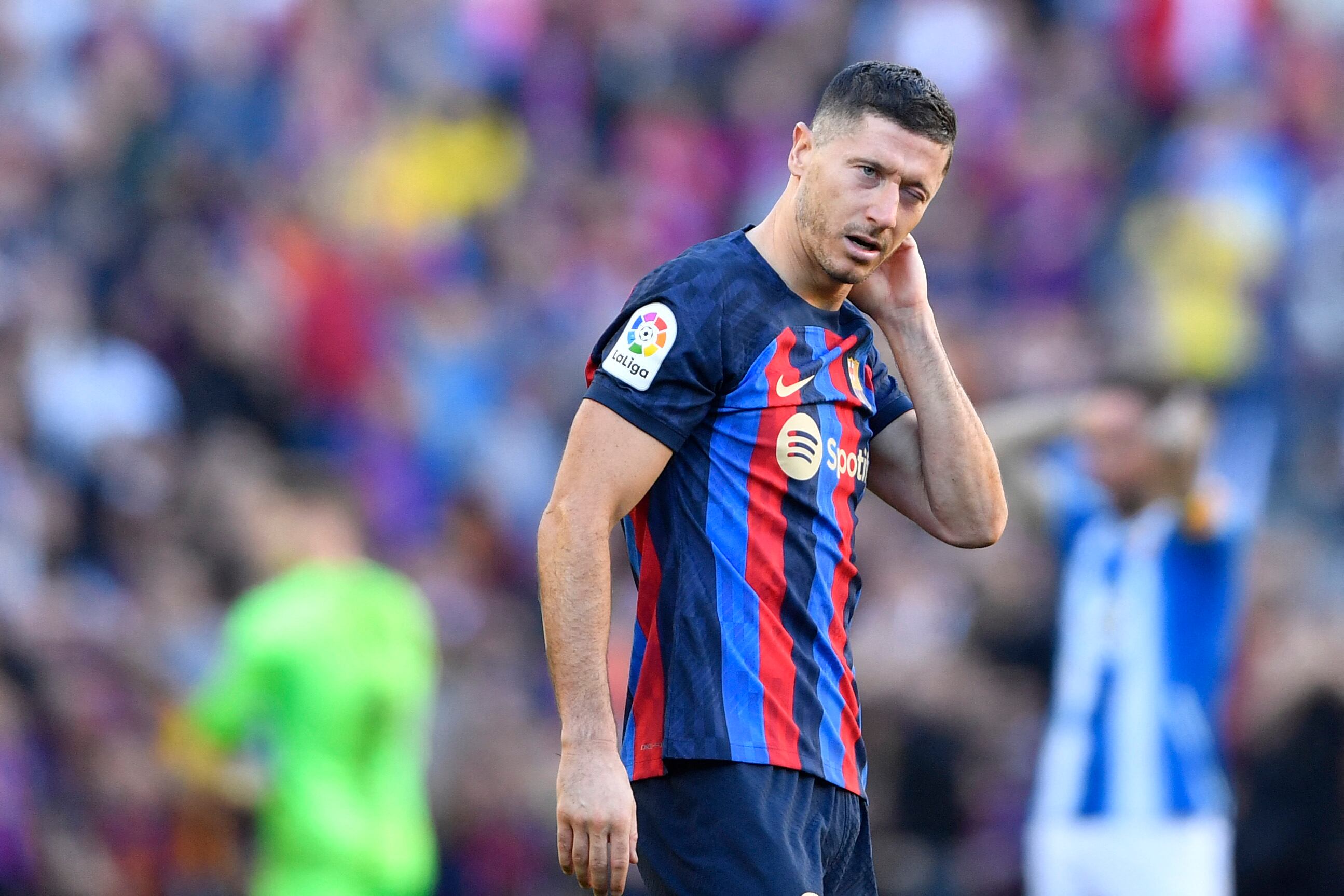 Barcelona's Polish forward Robert Lewandowski reacts during the Spanish League football match between FC Barcelona and RCD Espanyol at the Camp Nou stadium in Barcelona on December 31, 2022. (Photo by Pau BARRENA / AFP)