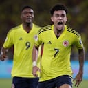 Colombia's Luis Diaz, front, celebrates scoring his side's second goal against Brazil during a qualifying soccer match for the FIFA World Cup 2026 at Roberto Melendez stadium in Barranquilla, Colombia, Thursday, Nov. 16, 2023. (AP Photo/Ivan Valencia)