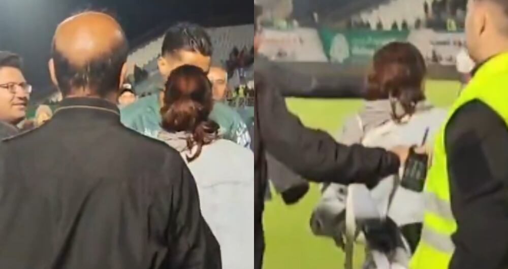 Momento en que el arquero internacional Hossein Hosseini abraza a la joven.