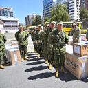 Military personnel prepare to dispatch election material during preparations on the eve of the local elections and referendum in Quito on February 4, 2023. - Some 13.4 million Ecuadorians will go to the polls this Sunday to elect 23 provincial prefects, 221 mayors, 1,307 councilors, and other subnational authorities. The referendum vote will rule on constitutional reforms which include the extradition of compatriots, the reduction of the number of national legislators, and a change in regulations related to natural resources among others. (Photo by Rodrigo BUENDIA / AFP)