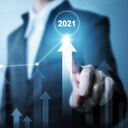 Businessman pointing arrow graph corporate future growth plan. Business development to success and growing growth year 2020 to 2021 concept