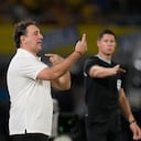 Colombia's coach Nestor Lorenzo gives instructions during a World Cup 2026 qualifying soccer match against Paraguay at Metropolitano Stadium in Barranquilla, Colombia, Tuesday, March 25, 2025. (AP Photo/Fernando Vergara)