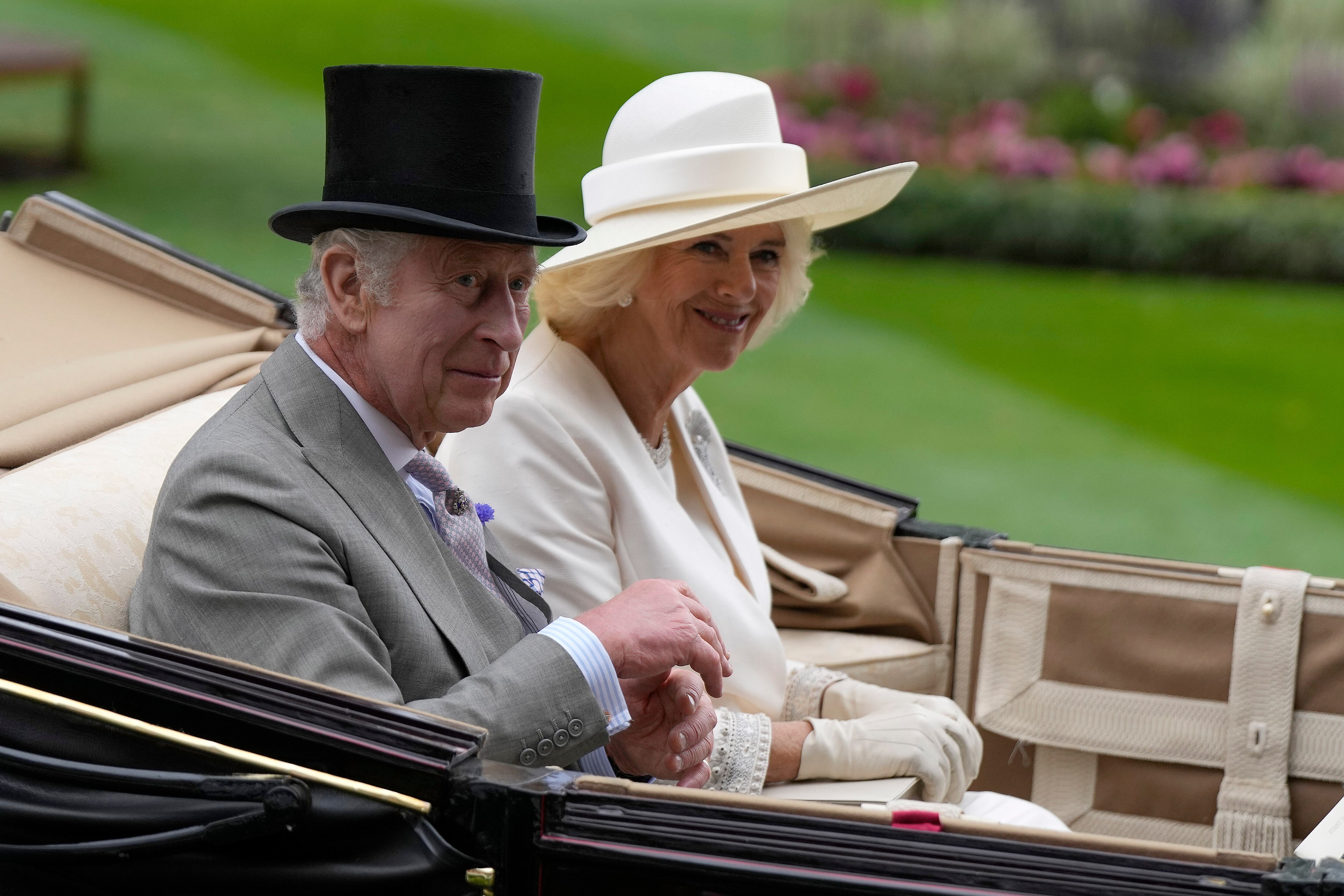 King Charles III and Camilla, the Queen Consort,