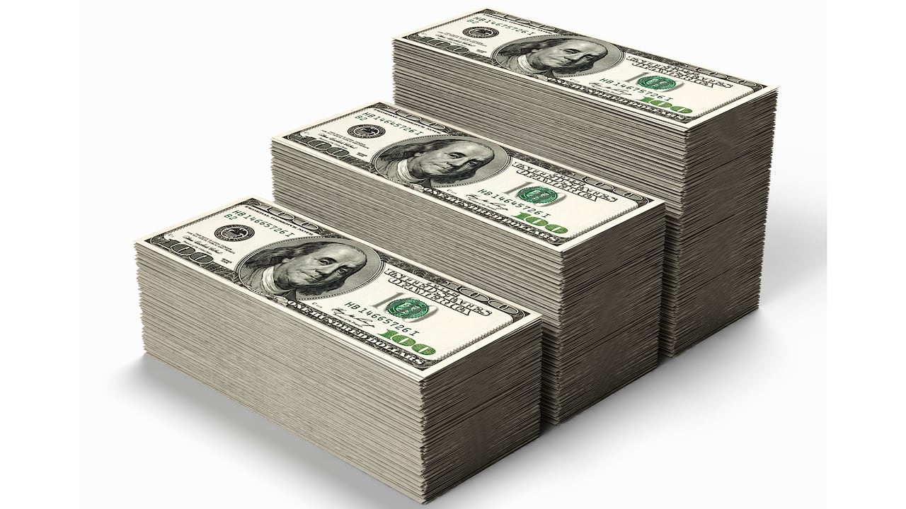 Fajos de billetes de cien dólares dolar