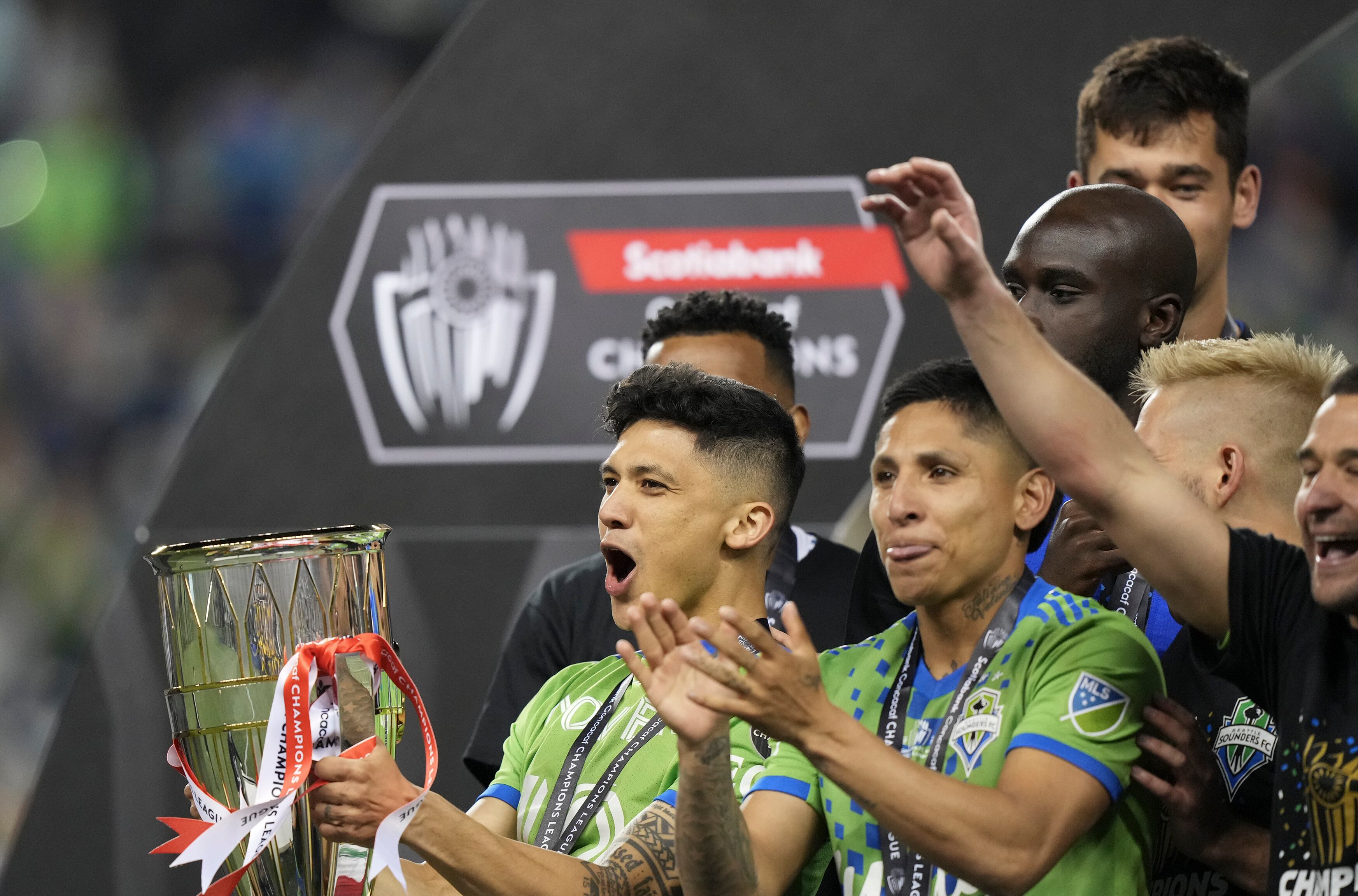 SEATTLE, WA - MAY 04: Seattle Sounders forward Fredy Montero (12) reacts while holding the CONCACAF trophy after the CONCACAF Champions League Final match between the Seattle Sounders and Pumas UNAM on May 4, 2022 at Lumen Field in Seattle, WA.  (Photo by Jeff Halstead/Icon Sportswire via Getty Images)