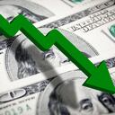 Money finance growth chart stock market with dollar moving down. currency devaluation.