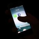 FILE - This Feb. 19, 2014, file photo shows the Facebook app icon on an iPhone in New York. Facebook is pushing back on Apple’s new privacy rules for iOS users — and putting app developers in the middle. The social network said Wednesday, Aug. 26, 2020 that anew policy by Apple that requires apps to ask users for permission to collect data on what devices they are using — and let ads follow them around on the internet — could lower the amount of money apps will make advertising through Facebook's audience network. (AP Photo/Karly Domb Sadof, File)