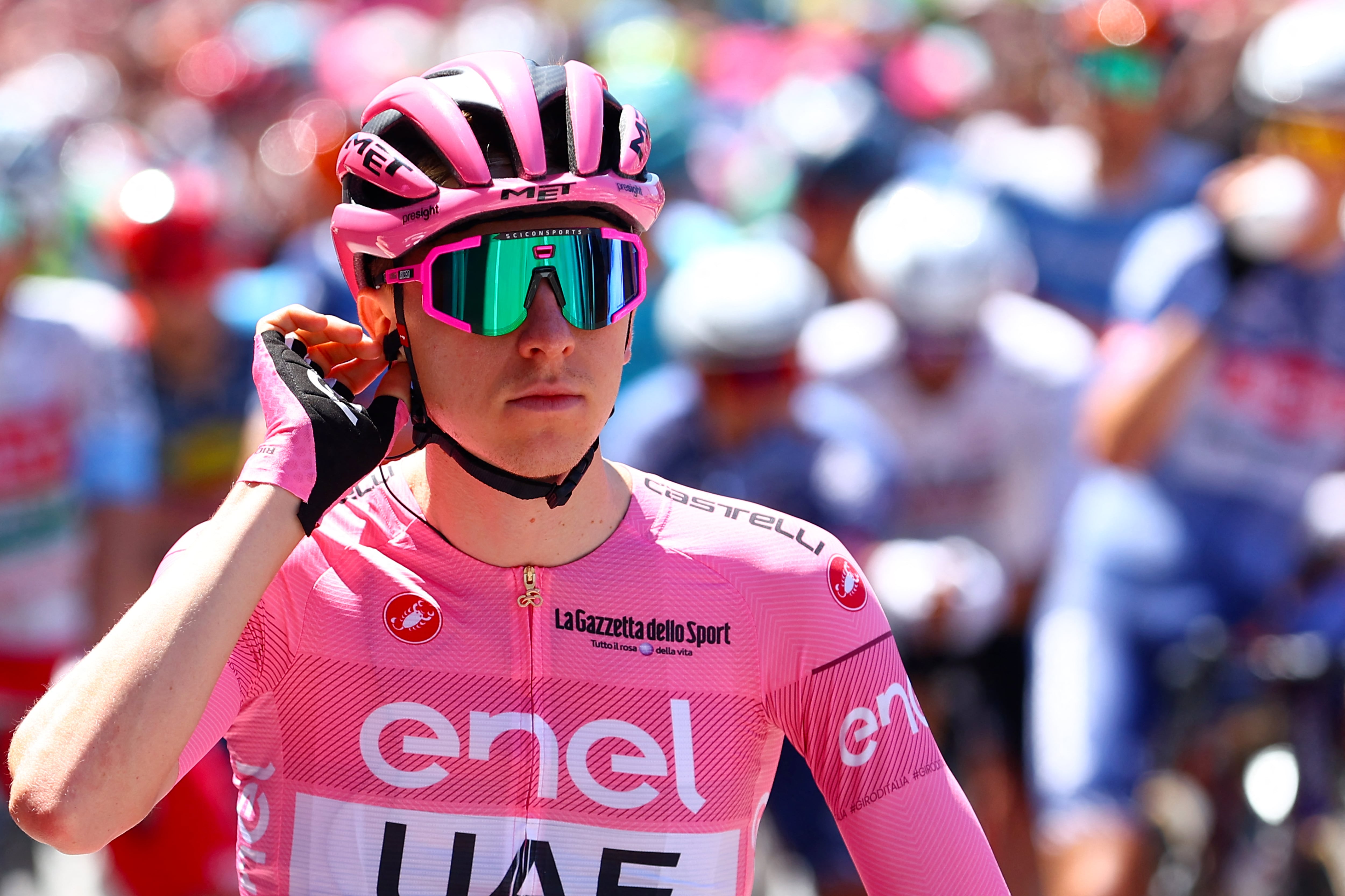 Pink Jersey, Team UAE's Slovenian rider Tadej Pogacar, takes the start of the 5th stage of the 107th Giro d'Italia cycling race, 178 km between Genova and Lucca, on May 8, 2024 in Genova. (Photo by Luca Bettini / AFP)