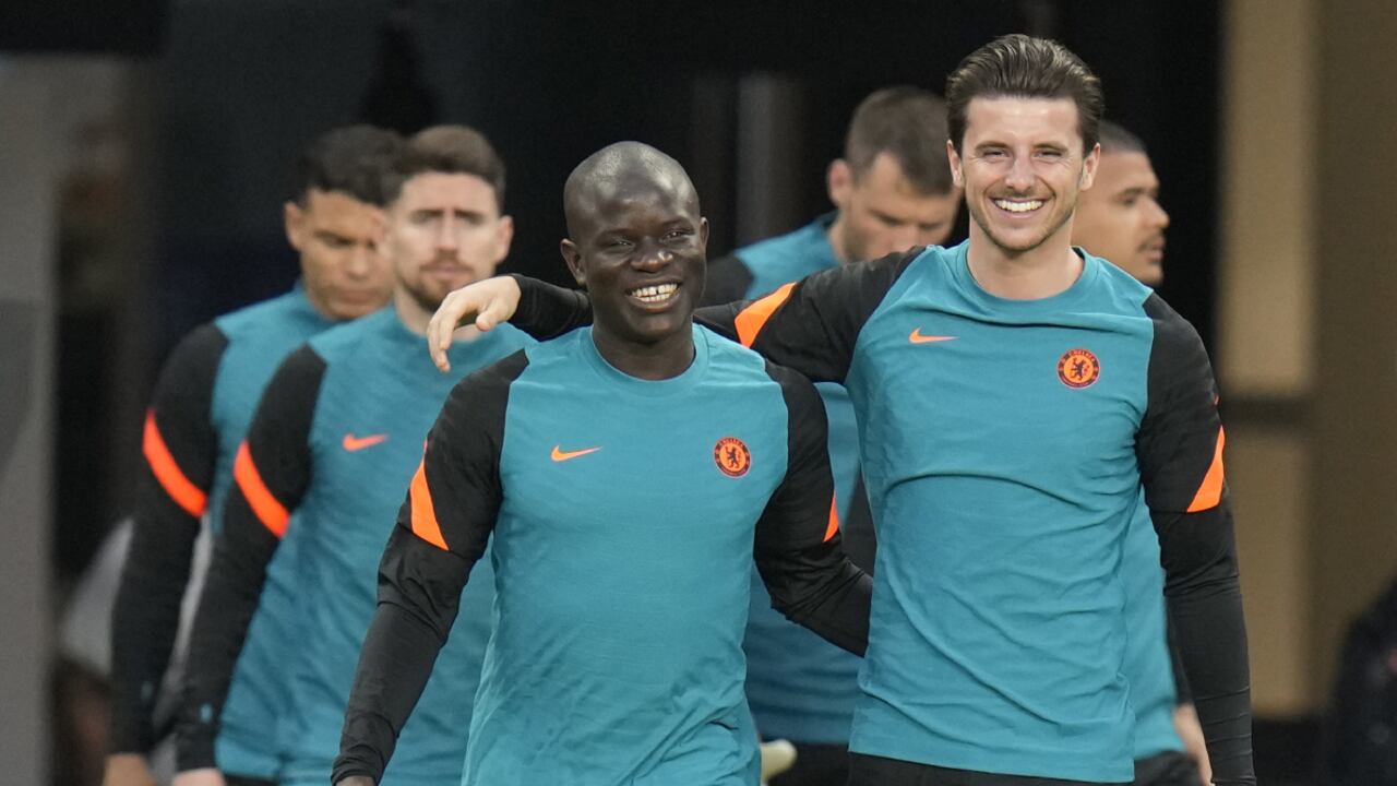 Chelsea's N'Golo Kante, left, and Chelsea's Mason Mount laugh during a training session in Abu Dhabi, United Arab Emirates, Tuesday, Feb. 8, 2022. Chelsea will play the Club World Cup semifinal soccer match against Al Hilal in Abu Dhabi on February 09. (AP Photo/Hassan Ammar)