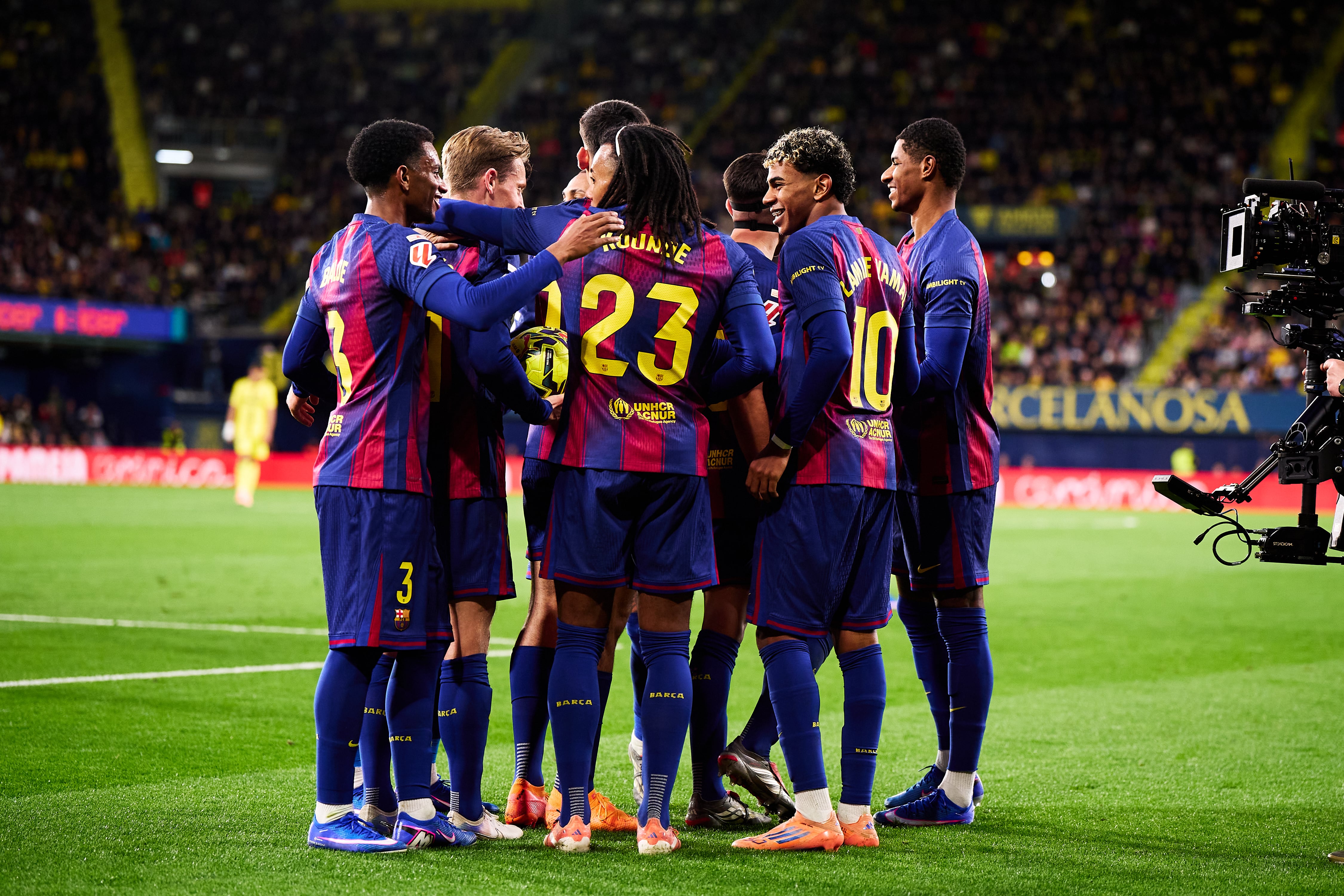VILLARREAL, SPAIN - DECEMBER 21: Lamine Yamal of FC Barcelona celebrates after scoring their side's second goal with his teammates during the LaLiga EA Sports match between Villarreal CF and FC Barcelona at Estadio de la Ceramica on December 21, 2025 in Villarreal, Spain. (Photo by Manuel Queimadelos/Quality Sport Images/Getty Images)