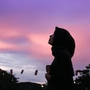 Asian hijab women enjoying at a city park