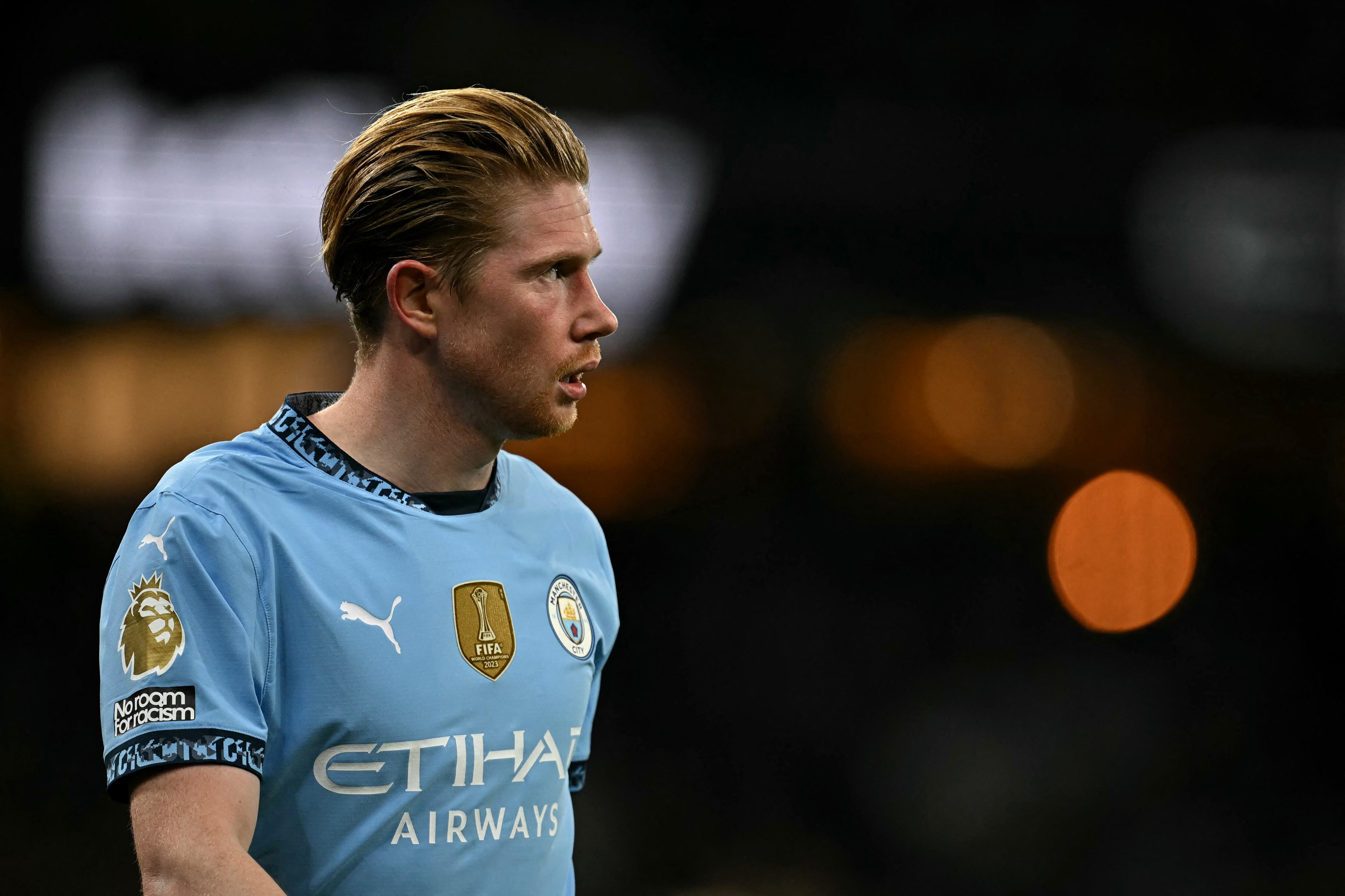 (FILES) Manchester City's Belgian midfielder #17 Kevin De Bruyne looks on during the English Premier League football match between Manchester City and Manchester United at the Etihad Stadium in Manchester, north west England, on December 15, 2024. Manchester City midfielder Kevin De Bruyne confirmed on Friday, April 4, that he will leave the club at the end of the season. (Photo by Paul ELLIS / AFP) / RESTRICTED TO EDITORIAL USE. No use with unauthorized audio, video, data, fixture lists, club/league logos or 'live' services. Online in-match use limited to 120 images. An additional 40 images may be used in extra time. No video emulation. Social media in-match use limited to 120 images. An additional 40 images may be used in extra time. No use in betting publications, games or single club/league/player publications. /