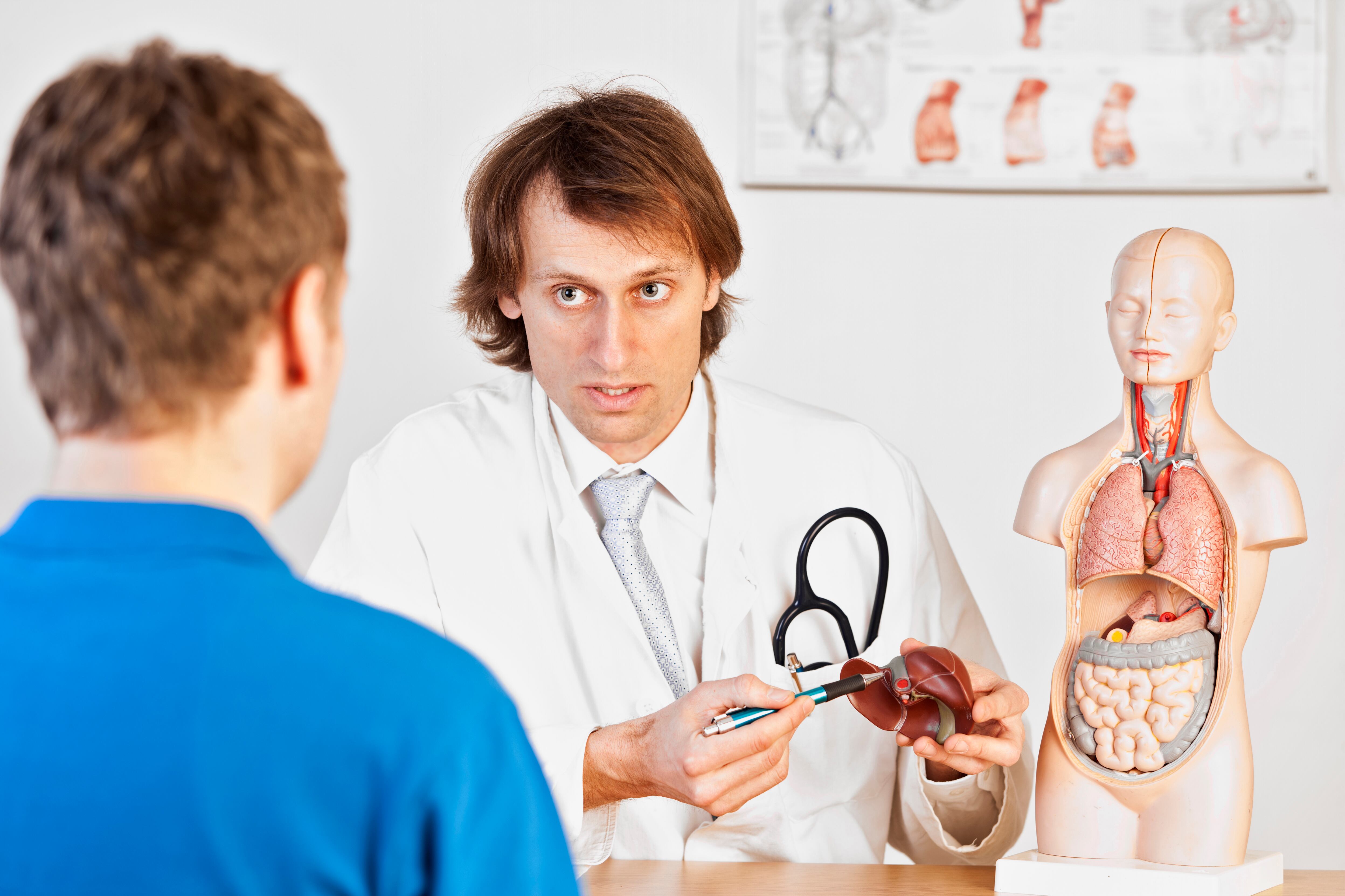 Doctor explaining liver problems