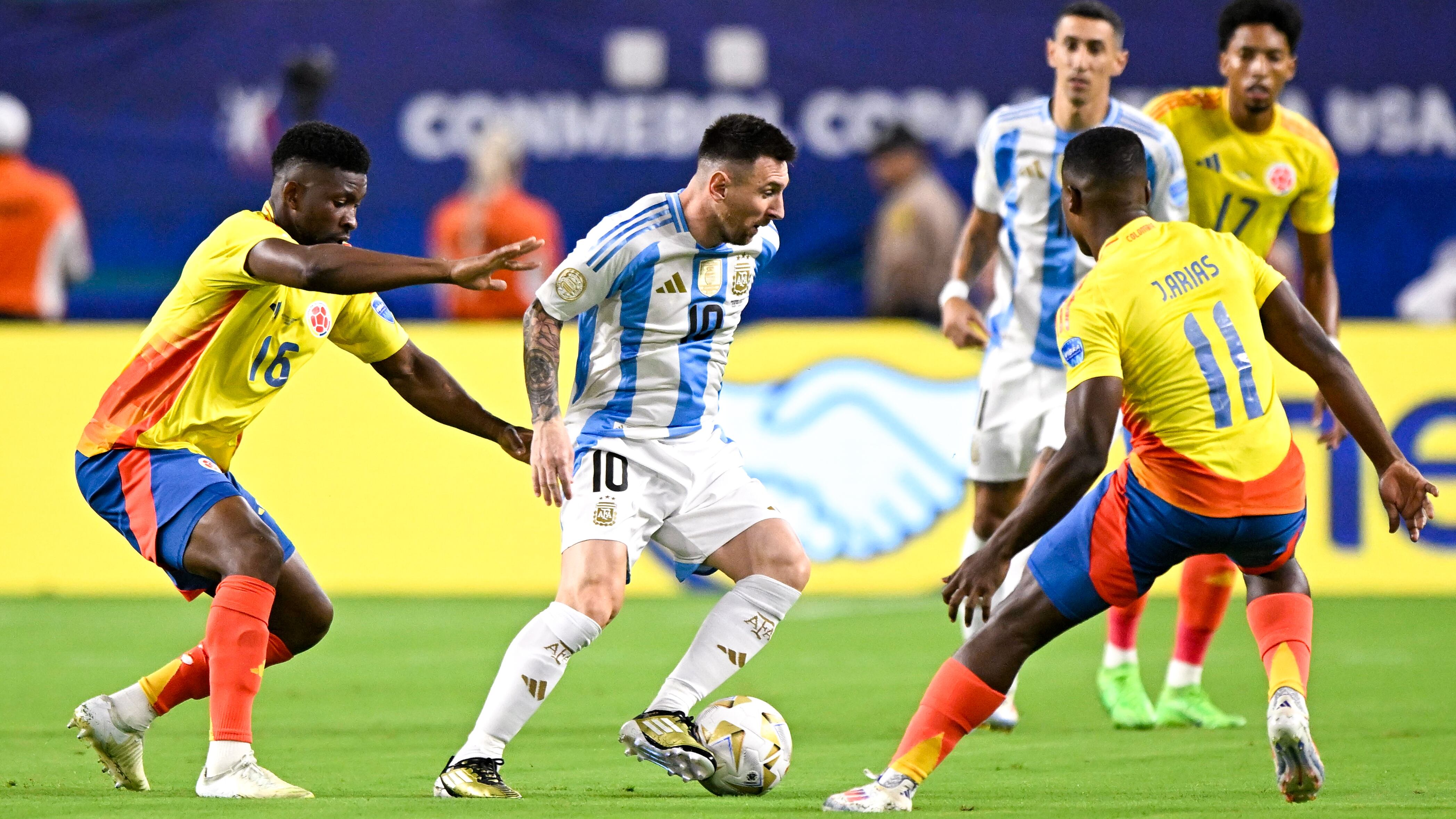 MIAMI GARDENS, UNITED STATES - JULY 15: Lionel Messi of Argentina battles for the ball with Jefferson Lerma of Colombia and Jhon Arias of Colombia during the CONMEBOL Copa America USA 2024 match between Argentina and Colombia at Hard Rock Stadium on July 15, 2024 in Miami Gardens, United States. (Photo by Pablo Morano/BSR Agency/Getty Images)