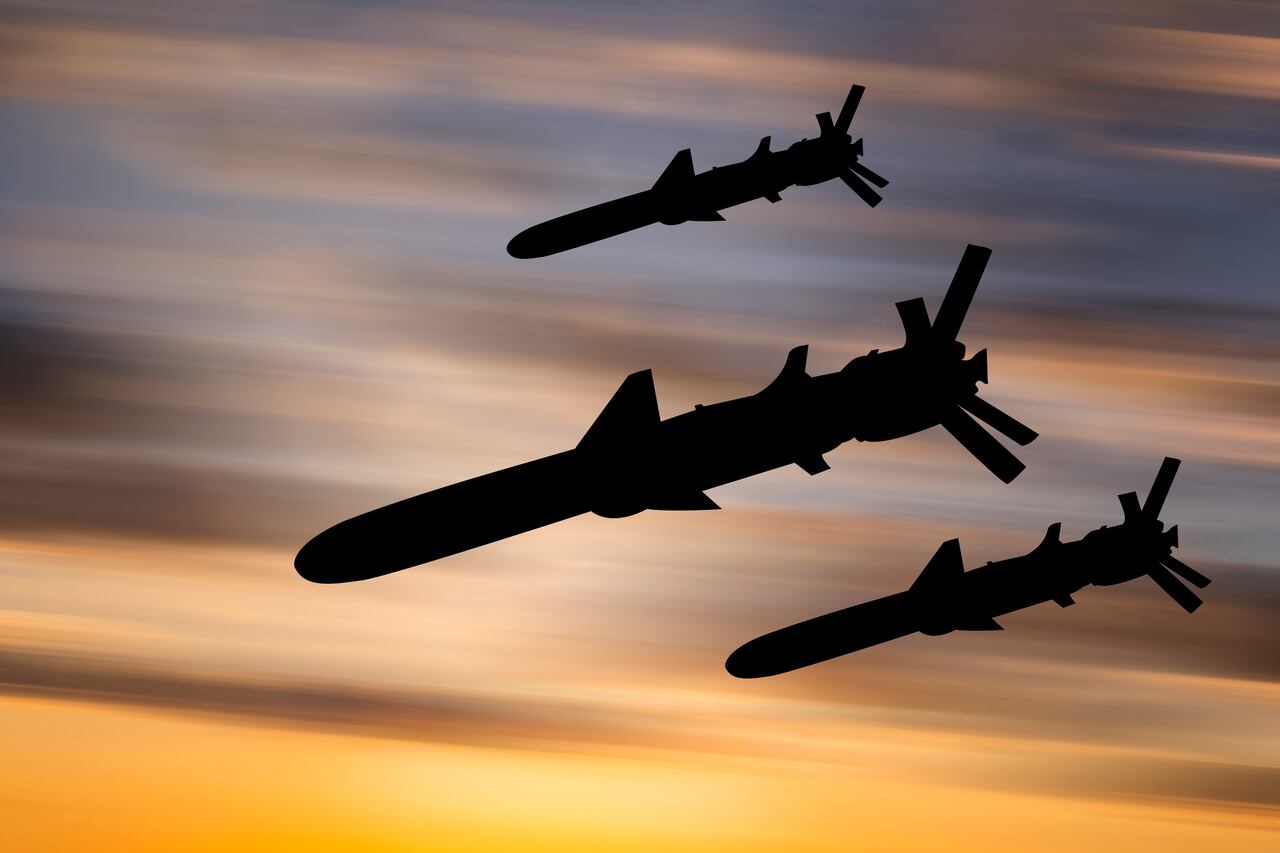 Cruise missiles against the sunset sky