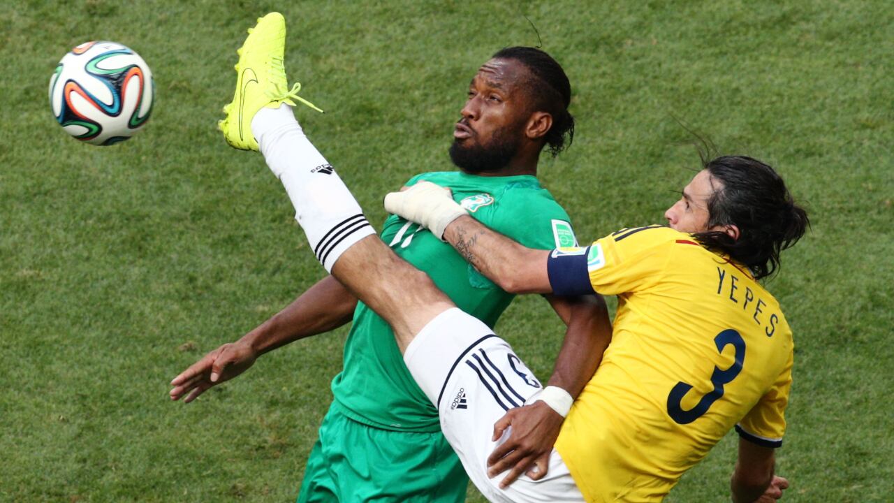 Drogba y Yepes, en contra, en el Mundial 2014.