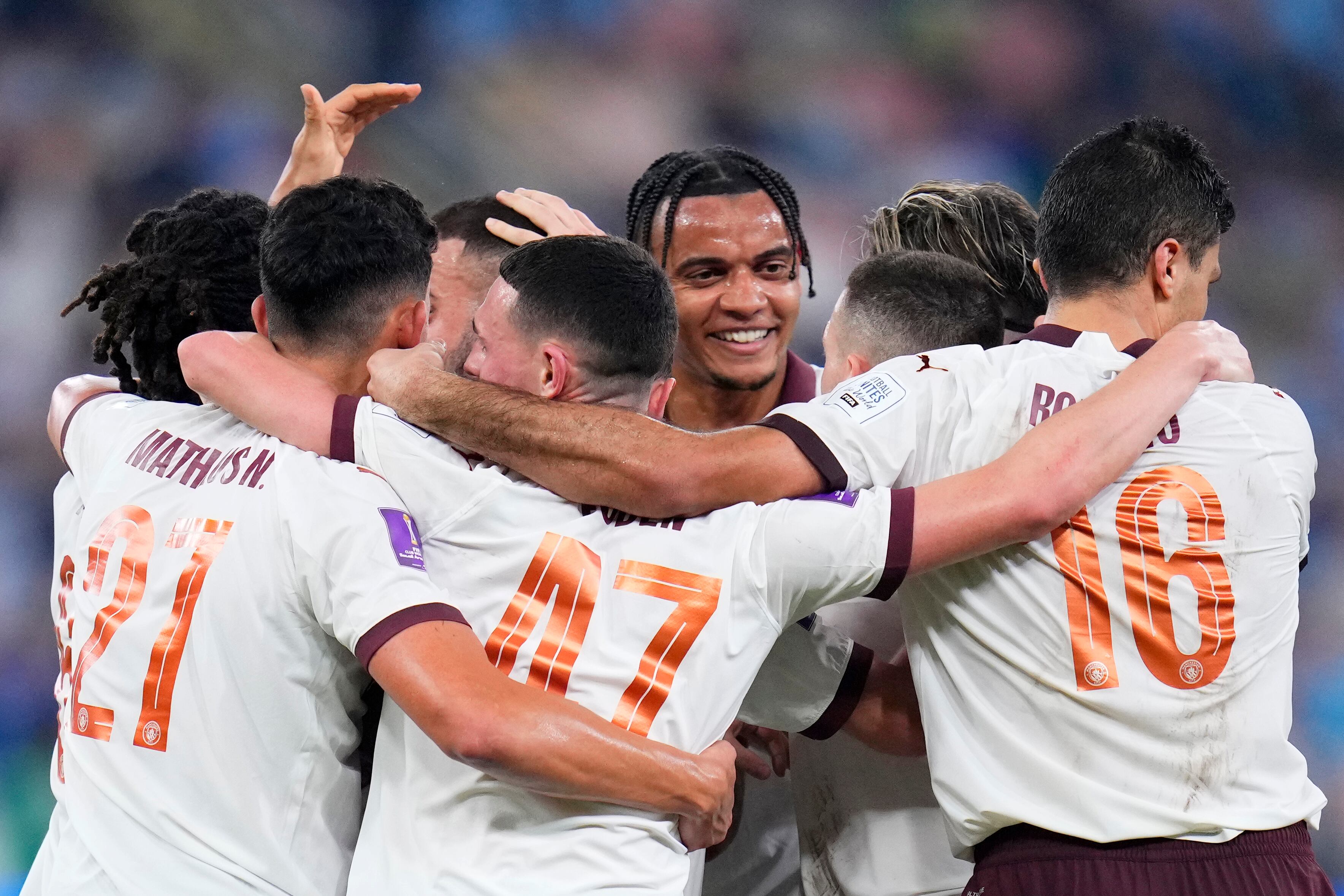 Manchester City players Celebrate after Mateo Kovacic scored their second goal during the Soccer Club World Cup semifinal soccer match between Urawa Reds and Manchester City FC at King Abdullah Sports City Stadium in Jeddah, Saudi Arabia, Tuesday, Dec. 19, 2023. (AP Photo/Manu Fernandez)