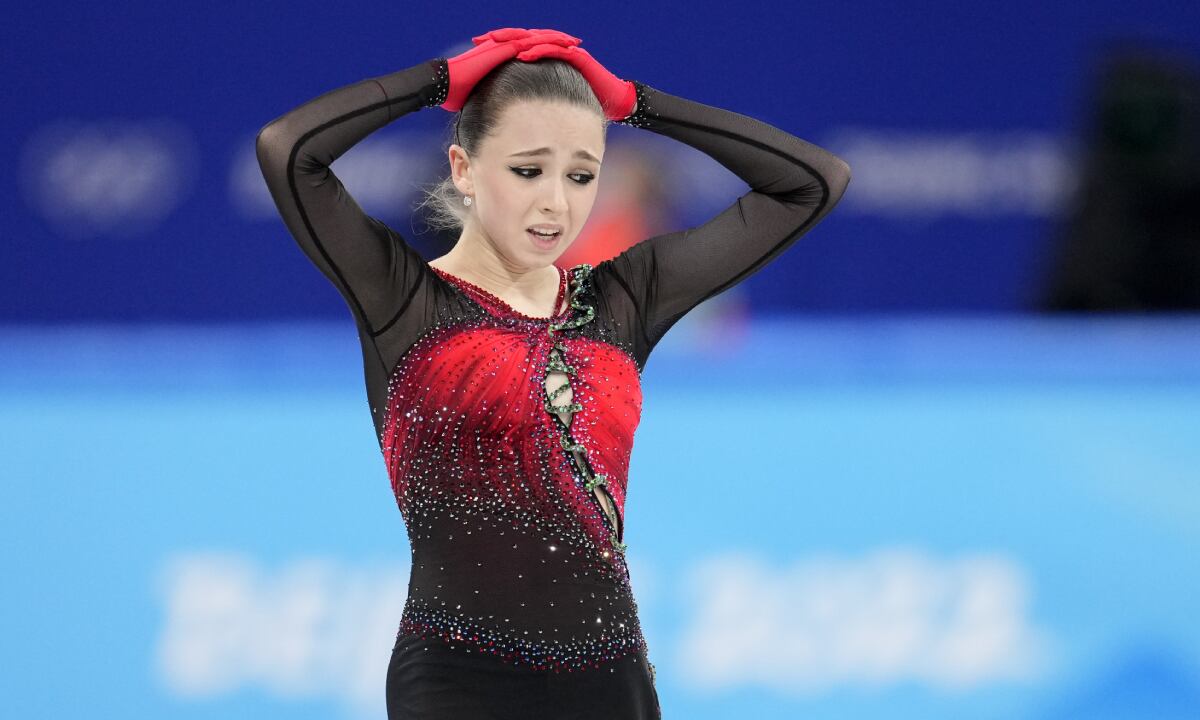 Kamila Valieva, 15, of the Russian Olympic Committee, reacts after the women's team free skate program during the figure skating competition at the 2022 Winter Olympics, Monday, Feb. 7, 2022, in Beijing. The 2022 Games' first major scandal has managed to involve the 15-year-old figure skater who has tested positive for using a banned heart medication that may cost her Russia-but-not-really-Russia team a gold medal in team competition. Kamila Valieva continues to train even as her final disposition is considered, and she may yet compete in the women's individual competition, in which she is favored. (AP/Natacha Pisarenko)