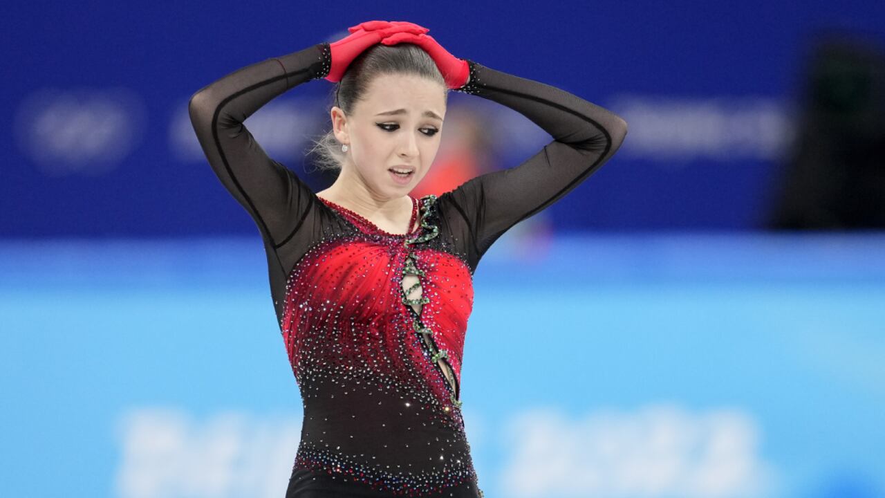 Kamila Valieva, 15, of the Russian Olympic Committee, reacts after the women's team free skate program during the figure skating competition at the 2022 Winter Olympics, Monday, Feb. 7, 2022, in Beijing. The 2022 Games' first major scandal has managed to involve the 15-year-old figure skater who has tested positive for using a banned heart medication that may cost her Russia-but-not-really-Russia team a gold medal in team competition. Kamila Valieva continues to train even as her final disposition is considered, and she may yet compete in the women's individual competition, in which she is favored. (AP Photo/Natacha Pisarenko)