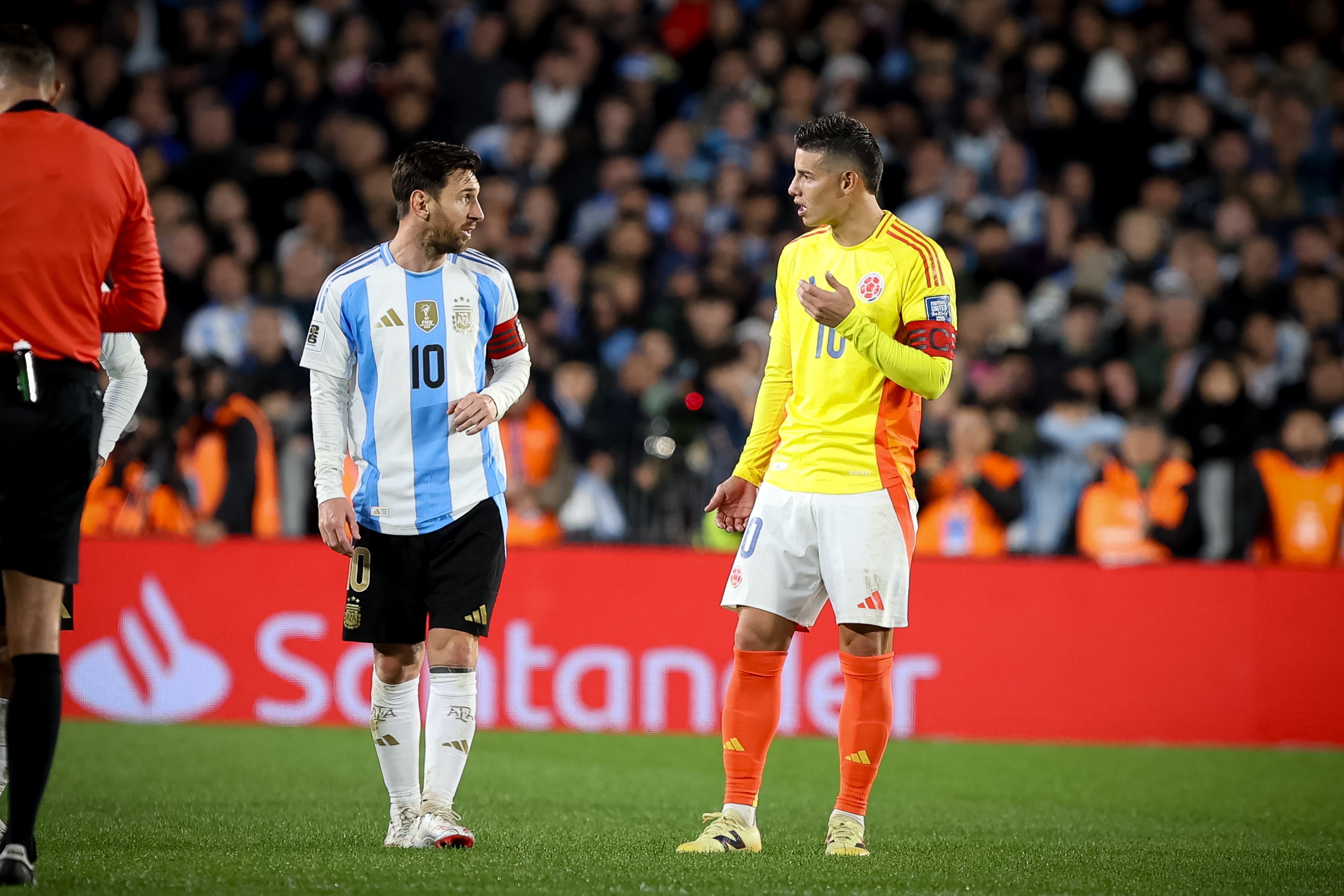 BUENOS AIRES, ARGENTINA - 2025/06/10: Lionel Messi of Argentina (L) and James Rodriguez of Colombia (R) reacts during the match between Argentina and Colombia as part of 2026 FIFA World Cup Qualifiers at Mas Monumental Stadium. Final score: Argentina 1 - 1 Colombia. (Photo by Roberto Tuero/SOPA Images/LightRocket via Getty Images)