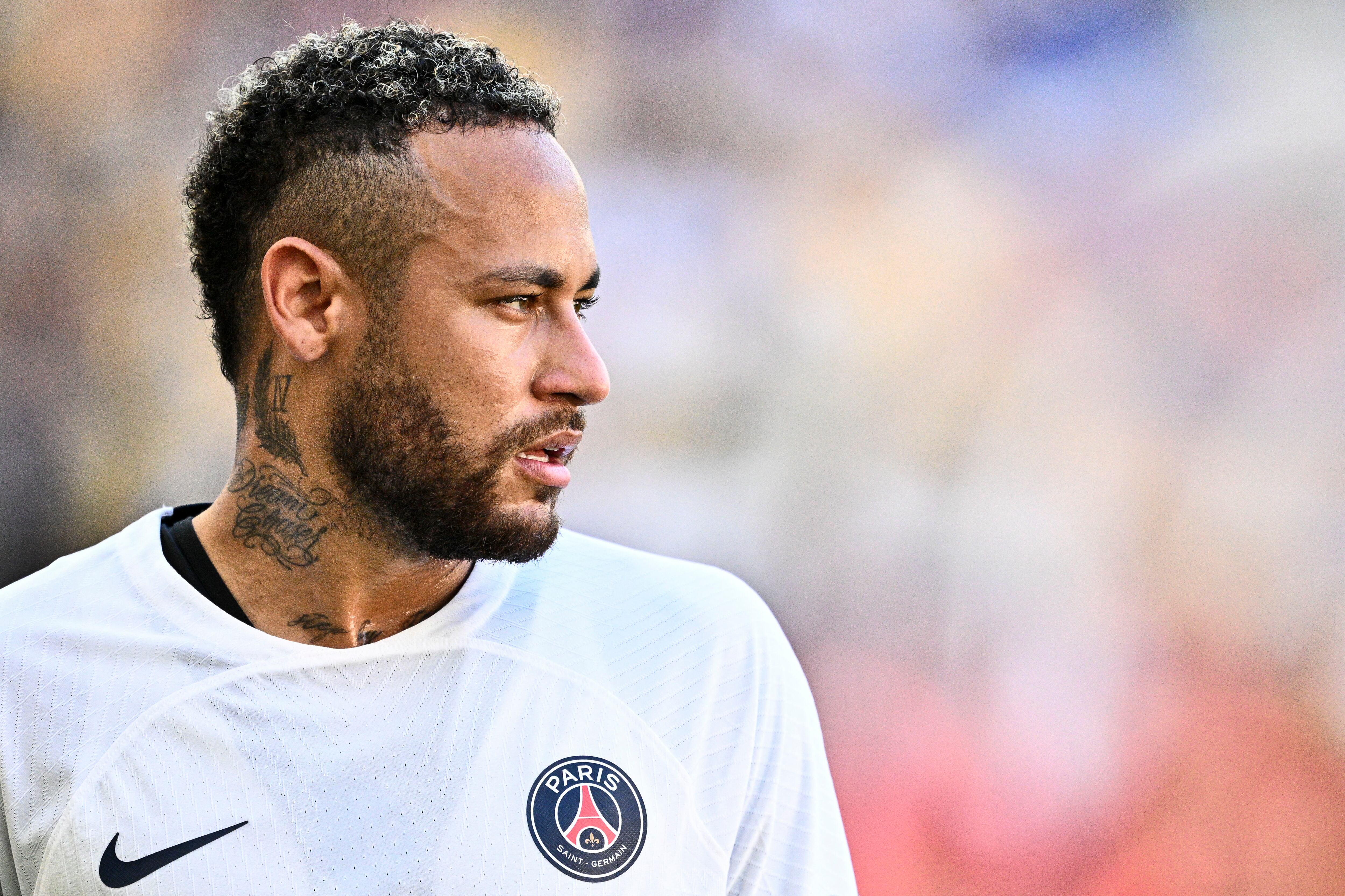 (FILES) Paris Saint-Germain�s Neymar prepares to take a corner during a friendly football match against Jeonbuk Hyundai Motors, at the Asiad Main Stadium in Busan on August 3, 2023. Brazilian striker Neymar is "probably about to leave" Paris Saint-Germain (PSG), a source close to the negotiations told AFP on August 13, 2023, referring to an offer from Saudi Arabia. (Photo by ANTHONY WALLACE / AFP)