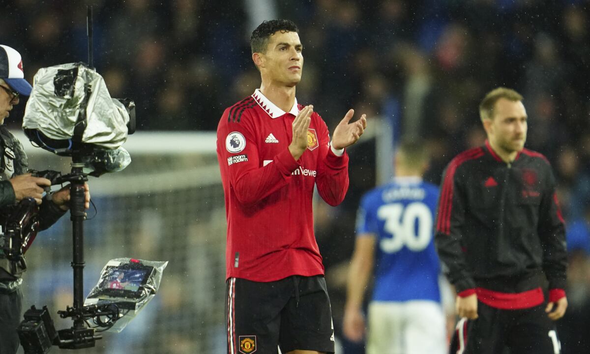 Manchester United's Cristiano Ronaldo applauds at the end of the Premier League soccer match between Everton and Manchester United at Goodison Park, in Liverpool, England, Sunday Oct. 9, 2022. Manchester United won 2-1 with a goal by Ronaldo. (AP/Jon Super)