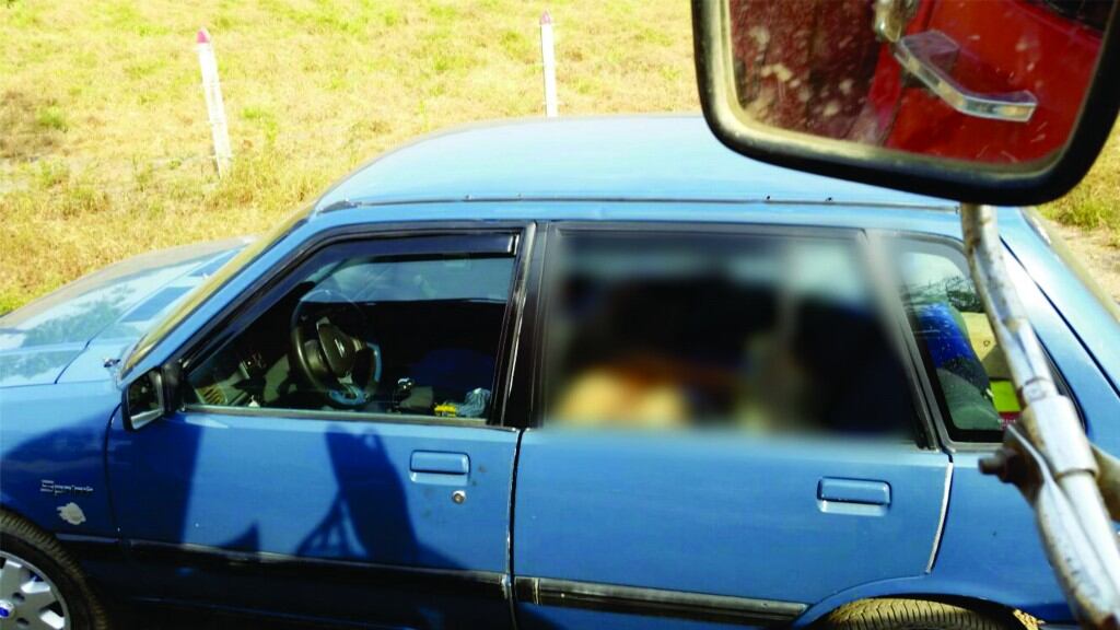 La víctima fue hallada interior de un automóvil sprint azul, en sector rural de Maní.